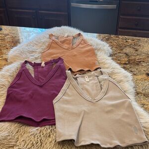 Bundle FP Movement All Clear Crop Racerback tanks. 3 in total. All size M/L.